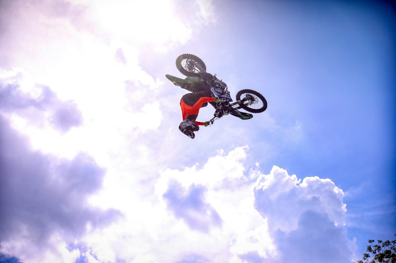 Rider mid-air during a slow-motion jump replay